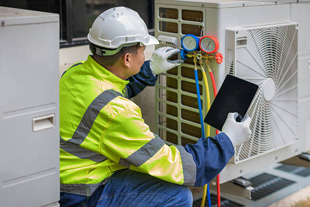 Professional Air Duct Cleaning technician working in Osseo, WI